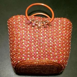 Victoria's Secret weaved, sequin Handbag.
